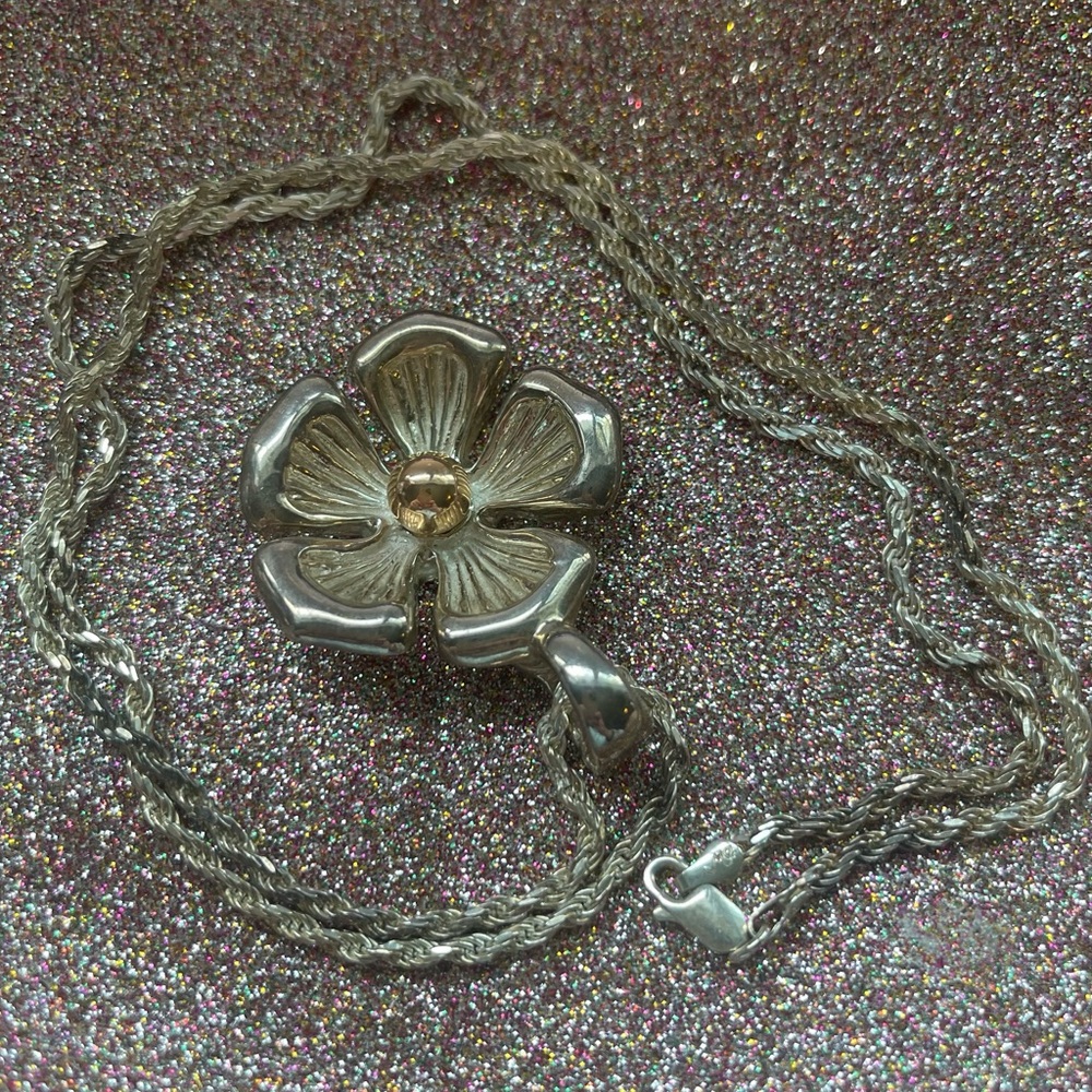 Sterling silver flower necklace.